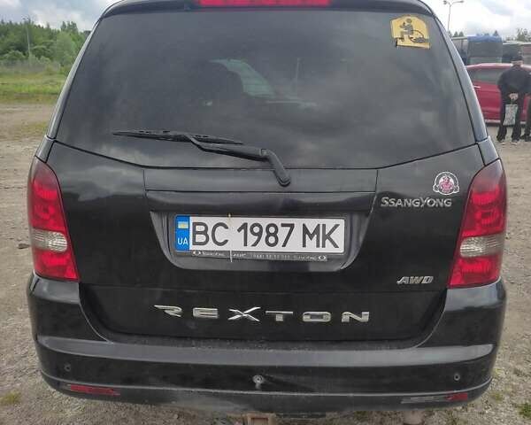 Чорний Cанг Йонг Rexton, об'ємом двигуна 2.7 л та пробігом 490 тис. км за 6000 $, фото 3 на Automoto.ua