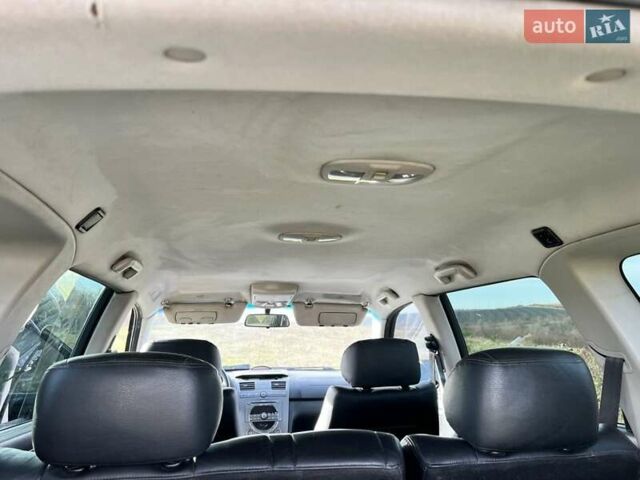 Черный Cанг Йонг Рекстон, объемом двигателя 2.7 л и пробегом 246 тыс. км за 6600 $, фото 19 на Automoto.ua