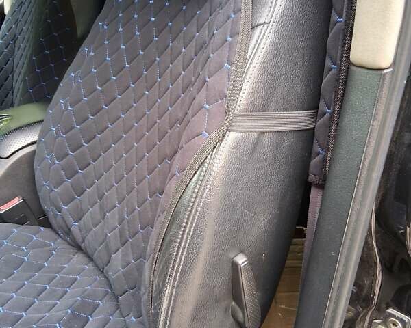 Чорний Cанг Йонг Rexton, об'ємом двигуна 2.7 л та пробігом 224 тис. км за 7450 $, фото 33 на Automoto.ua