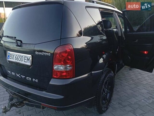 Черный Cанг Йонг Рекстон, объемом двигателя 2.7 л и пробегом 188 тыс. км за 6200 $, фото 13 на Automoto.ua