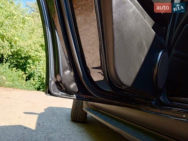 Чорний Cанг Йонг Rexton, об'ємом двигуна 2.7 л та пробігом 321 тис. км за 7500 $, фото 6 на Automoto.ua