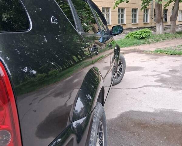 Чорний Cанг Йонг Rexton, об'ємом двигуна 2.7 л та пробігом 224 тис. км за 7450 $, фото 13 на Automoto.ua