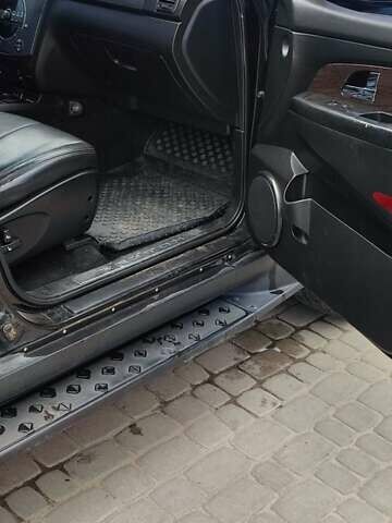 Черный Cанг Йонг Рекстон, объемом двигателя 2.7 л и пробегом 230 тыс. км за 8000 $, фото 14 на Automoto.ua