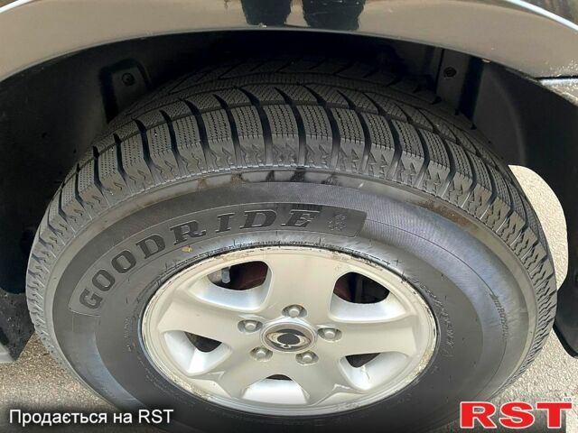 Черный Cанг Йонг Рекстон, объемом двигателя 2.7 л и пробегом 188 тыс. км за 7999 $, фото 10 на Automoto.ua