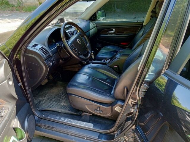 Чорний Cанг Йонг Rexton, об'ємом двигуна 2.7 л та пробігом 320 тис. км за 8000 $, фото 5 на Automoto.ua