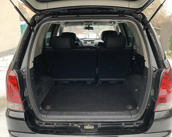 Черный Cанг Йонг Рекстон, объемом двигателя 2.7 л и пробегом 232 тыс. км за 6600 $, фото 7 на Automoto.ua