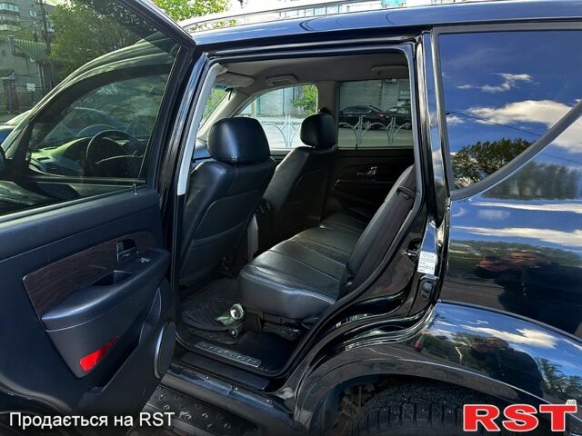 Чорний Cанг Йонг Rexton, об'ємом двигуна 2.7 л та пробігом 218 тис. км за 9000 $, фото 6 на Automoto.ua