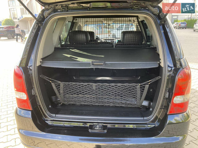 Чорний Cанг Йонг Rexton, об'ємом двигуна 2.7 л та пробігом 159 тис. км за 8499 $, фото 22 на Automoto.ua