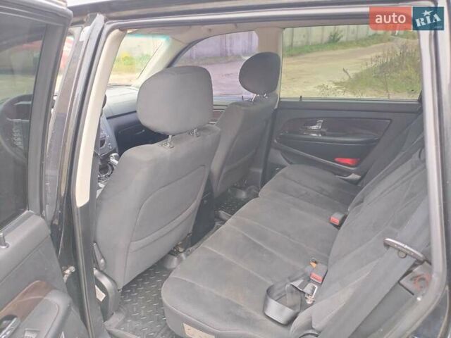 Чорний Cанг Йонг Rexton, об'ємом двигуна 2.7 л та пробігом 196 тис. км за 8200 $, фото 11 на Automoto.ua