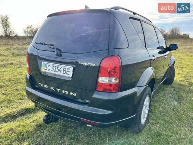 Черный Cанг Йонг Рекстон, объемом двигателя 2.7 л и пробегом 246 тыс. км за 6600 $, фото 8 на Automoto.ua