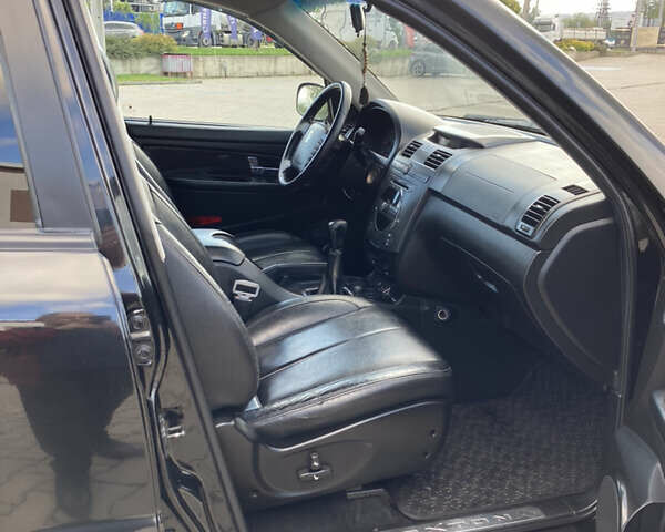 Чорний Cанг Йонг Rexton, об'ємом двигуна 2.7 л та пробігом 159 тис. км за 8900 $, фото 11 на Automoto.ua