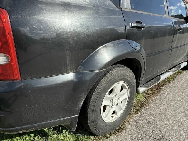 Чорний Cанг Йонг Rexton, об'ємом двигуна 2.7 л та пробігом 300 тис. км за 4500 $, фото 6 на Automoto.ua