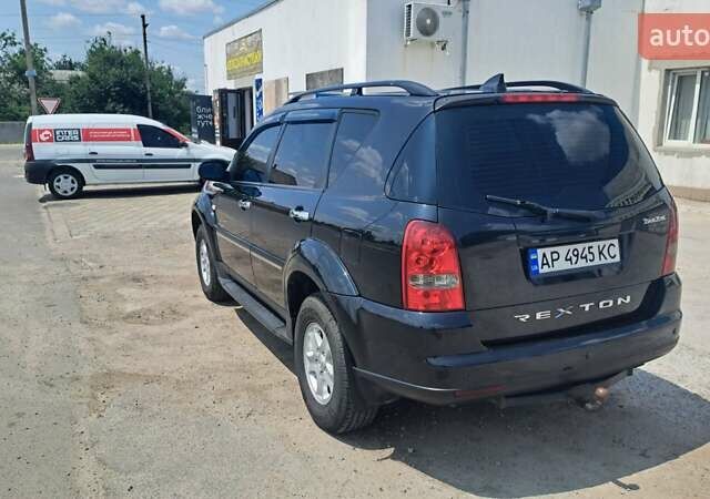 Черный Cанг Йонг Рекстон, объемом двигателя 2.7 л и пробегом 250 тыс. км за 8000 $, фото 5 на Automoto.ua