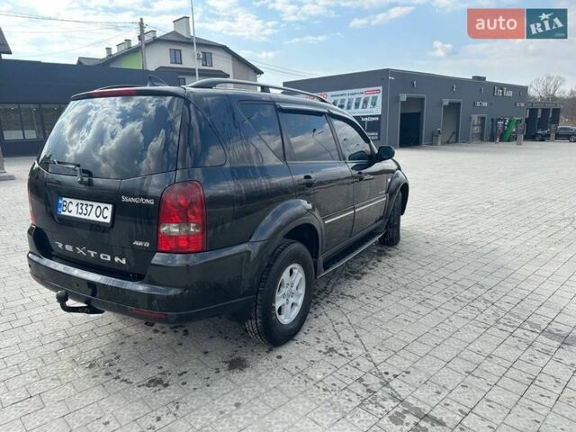 Черный Cанг Йонг Рекстон, объемом двигателя 2.7 л и пробегом 190 тыс. км за 8000 $, фото 6 на Automoto.ua