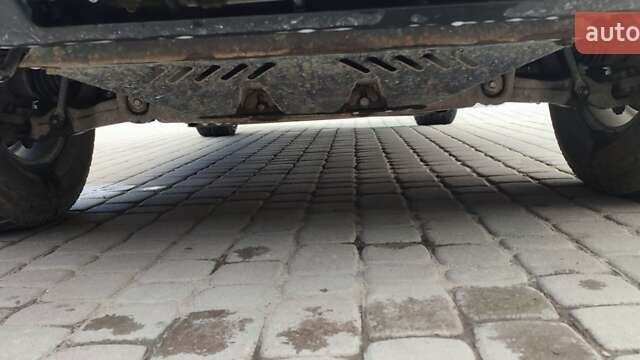 Черный Cанг Йонг Рекстон, объемом двигателя 2.7 л и пробегом 230 тыс. км за 8000 $, фото 19 на Automoto.ua