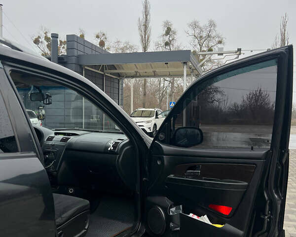 Черный Cанг Йонг Рекстон, объемом двигателя 2.7 л и пробегом 318 тыс. км за 8700 $, фото 11 на Automoto.ua