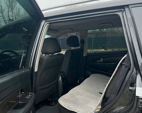 Черный Cанг Йонг Рекстон, объемом двигателя 2.7 л и пробегом 318 тыс. км за 8700 $, фото 12 на Automoto.ua