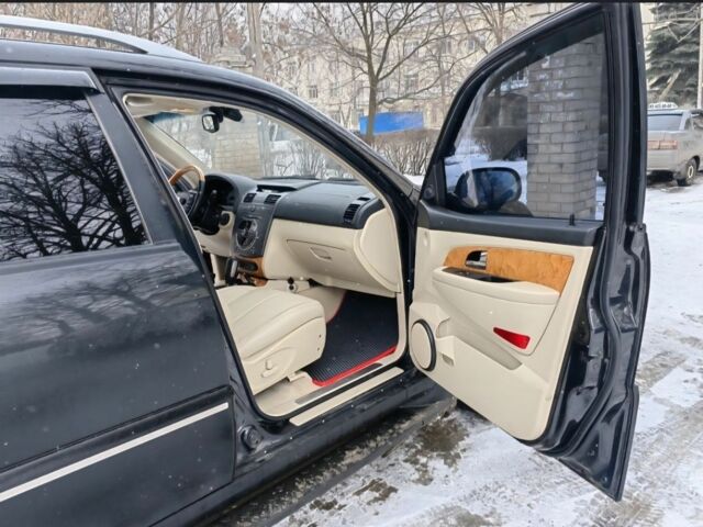 Черный Cанг Йонг Рекстон, объемом двигателя 2.7 л и пробегом 170 тыс. км за 9999 $, фото 3 на Automoto.ua