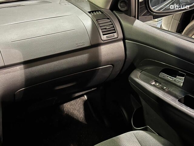 Черный Cанг Йонг Рекстон, объемом двигателя 2.7 л и пробегом 63 тыс. км за 11440 $, фото 16 на Automoto.ua