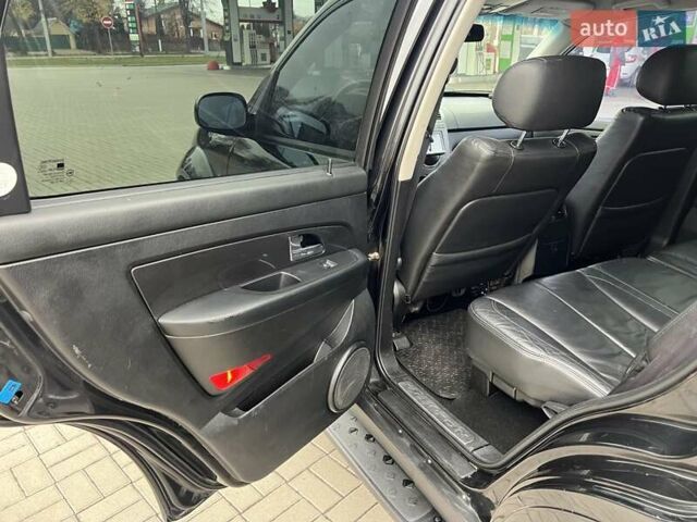 Чорний Cанг Йонг Rexton, об'ємом двигуна 2.7 л та пробігом 229 тис. км за 7500 $, фото 8 на Automoto.ua