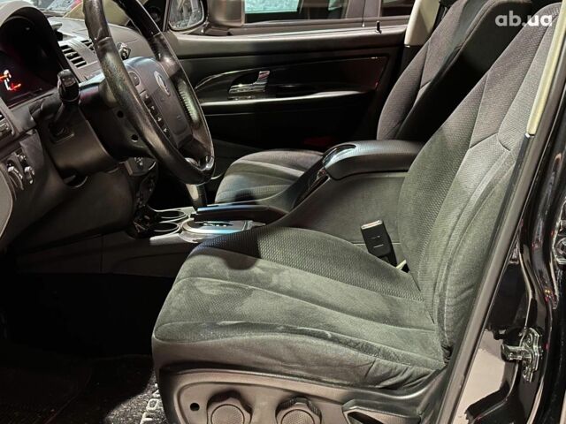 Черный Cанг Йонг Рекстон, объемом двигателя 2.7 л и пробегом 63 тыс. км за 11440 $, фото 7 на Automoto.ua