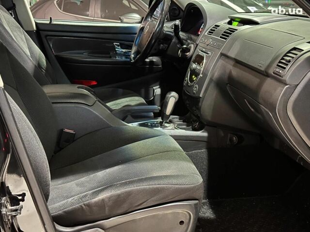 Черный Cанг Йонг Рекстон, объемом двигателя 2.7 л и пробегом 63 тыс. км за 11440 $, фото 18 на Automoto.ua