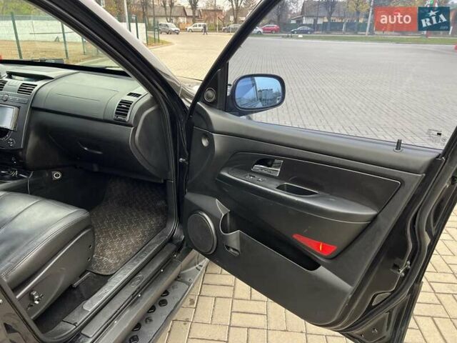 Чорний Cанг Йонг Rexton, об'ємом двигуна 2.7 л та пробігом 229 тис. км за 7500 $, фото 10 на Automoto.ua