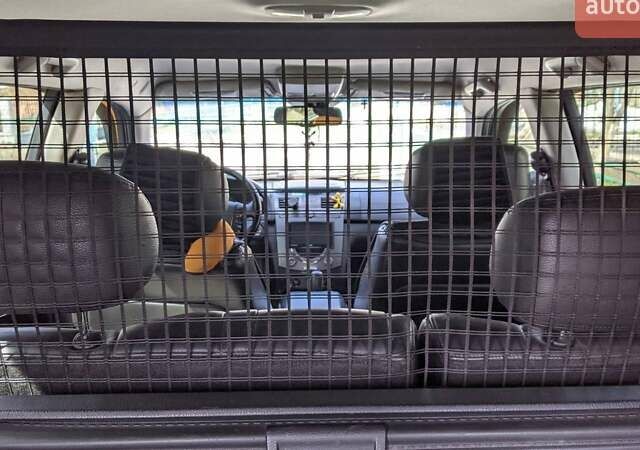 Чорний Cанг Йонг Rexton, об'ємом двигуна 2.66 л та пробігом 166 тис. км за 10300 $, фото 7 на Automoto.ua