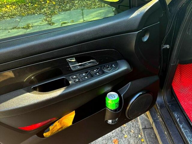 Черный Cанг Йонг Рекстон, объемом двигателя 2.7 л и пробегом 222 тыс. км за 6500 $, фото 6 на Automoto.ua