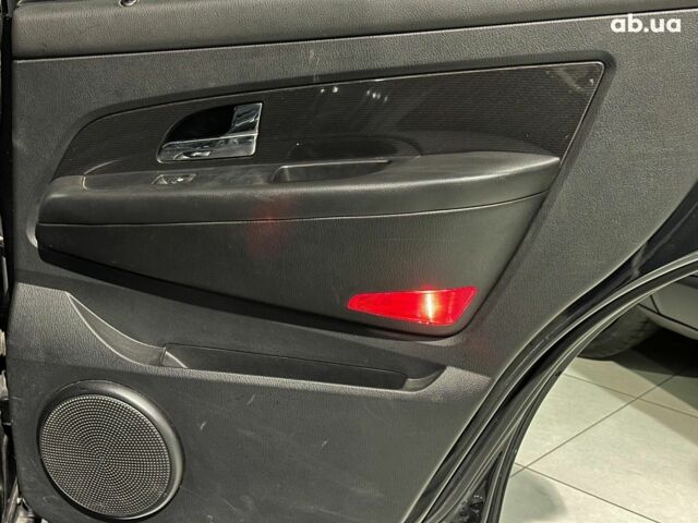 Черный Cанг Йонг Рекстон, объемом двигателя 2.7 л и пробегом 63 тыс. км за 11440 $, фото 14 на Automoto.ua