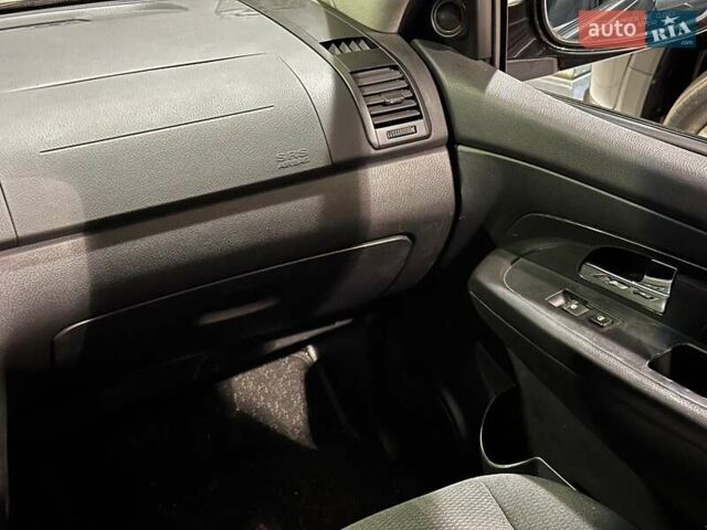 Черный Cанг Йонг Рекстон, объемом двигателя 2.7 л и пробегом 63 тыс. км за 11440 $, фото 16 на Automoto.ua