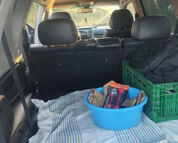 Чорний Cанг Йонг Rexton, об'ємом двигуна 2.7 л та пробігом 221 тис. км за 9000 $, фото 4 на Automoto.ua