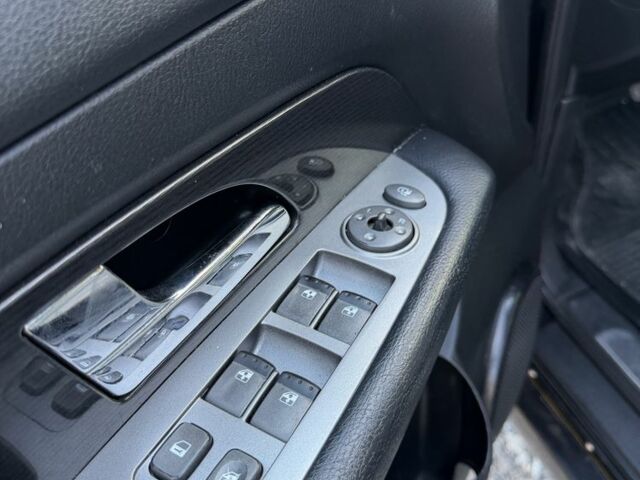 Чорний Cанг Йонг Rexton, об'ємом двигуна 2.7 л та пробігом 186 тис. км за 7879 $, фото 12 на Automoto.ua