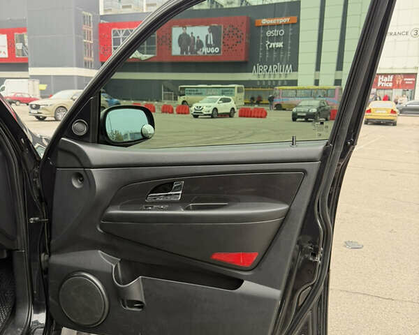 Черный Cанг Йонг Рекстон, объемом двигателя 2.7 л и пробегом 219 тыс. км за 10800 $, фото 12 на Automoto.ua