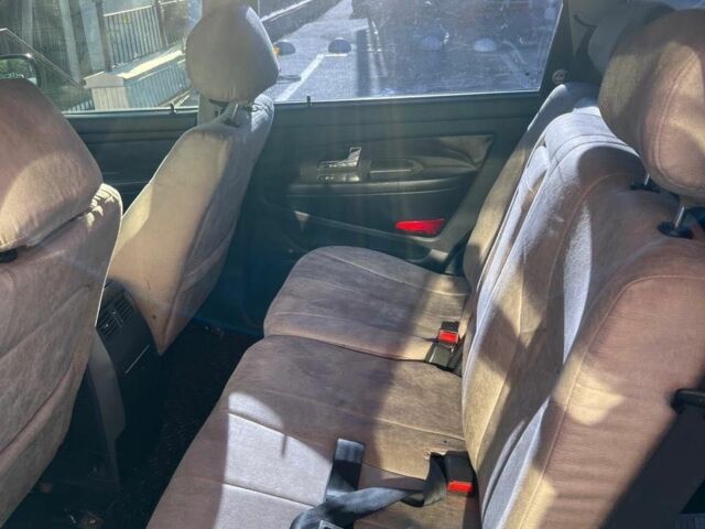 Черный Cанг Йонг Рекстон, объемом двигателя 2.7 л и пробегом 253 тыс. км за 7809 $, фото 6 на Automoto.ua