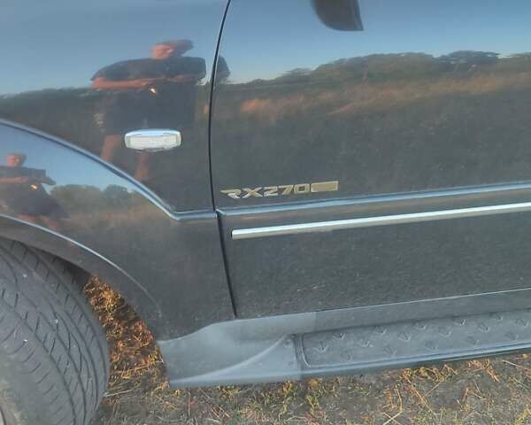 Чорний Cанг Йонг Rexton, об'ємом двигуна 2.7 л та пробігом 221 тис. км за 9000 $, фото 7 на Automoto.ua