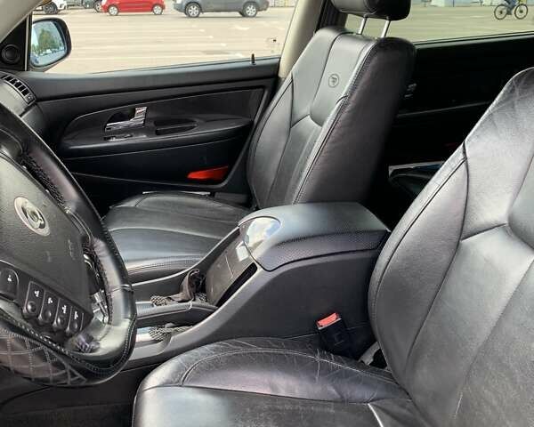 Чорний Cанг Йонг Rexton, об'ємом двигуна 2.7 л та пробігом 200 тис. км за 10500 $, фото 14 на Automoto.ua