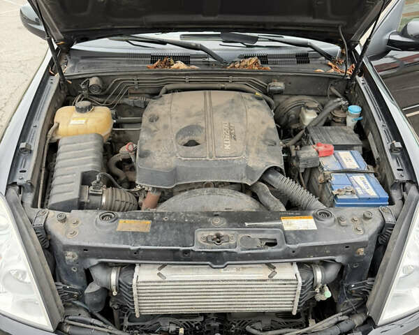 Черный Cанг Йонг Рекстон, объемом двигателя 2.7 л и пробегом 219 тыс. км за 10800 $, фото 23 на Automoto.ua