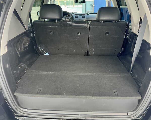 Черный Cанг Йонг Рекстон, объемом двигателя 2.7 л и пробегом 226 тыс. км за 8900 $, фото 28 на Automoto.ua