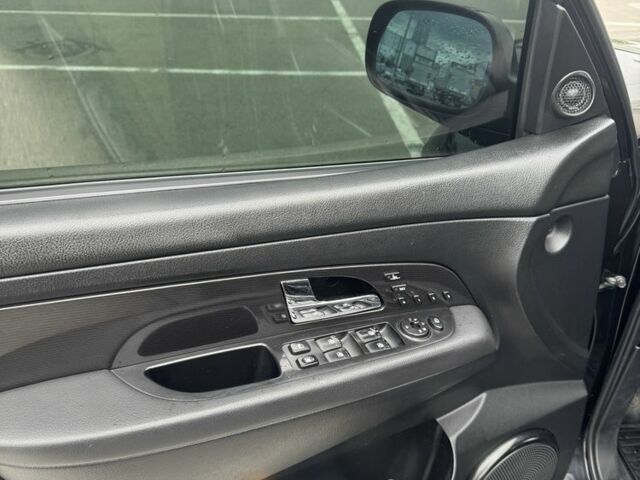 Черный Cанг Йонг Рекстон, объемом двигателя 2.7 л и пробегом 247 тыс. км за 10000 $, фото 17 на Automoto.ua