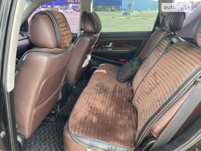Чорний Cанг Йонг Rexton, об'ємом двигуна 2 л та пробігом 179 тис. км за 9999 $, фото 16 на Automoto.ua
