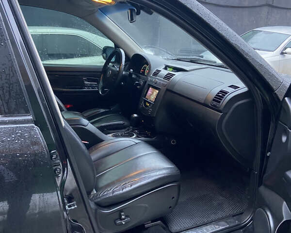 Черный Cанг Йонг Рекстон, объемом двигателя 2.7 л и пробегом 220 тыс. км за 9500 $, фото 5 на Automoto.ua