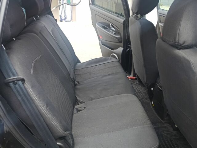 Черный Cанг Йонг Рекстон, объемом двигателя 2.7 л и пробегом 95 тыс. км за 17000 $, фото 3 на Automoto.ua