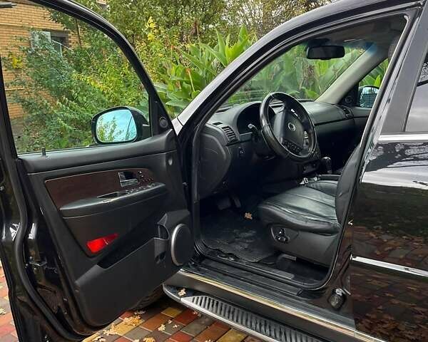 Черный Cанг Йонг Рекстон, объемом двигателя 2.7 л и пробегом 149 тыс. км за 12000 $, фото 11 на Automoto.ua