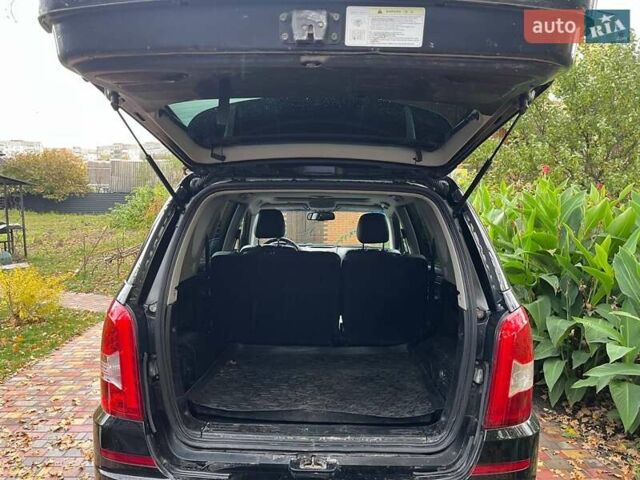 Черный Cанг Йонг Рекстон, объемом двигателя 2.7 л и пробегом 149 тыс. км за 12000 $, фото 10 на Automoto.ua