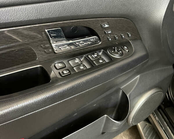 Чорний Cанг Йонг Rexton, об'ємом двигуна 2 л та пробігом 199 тис. км за 9300 $, фото 12 на Automoto.ua