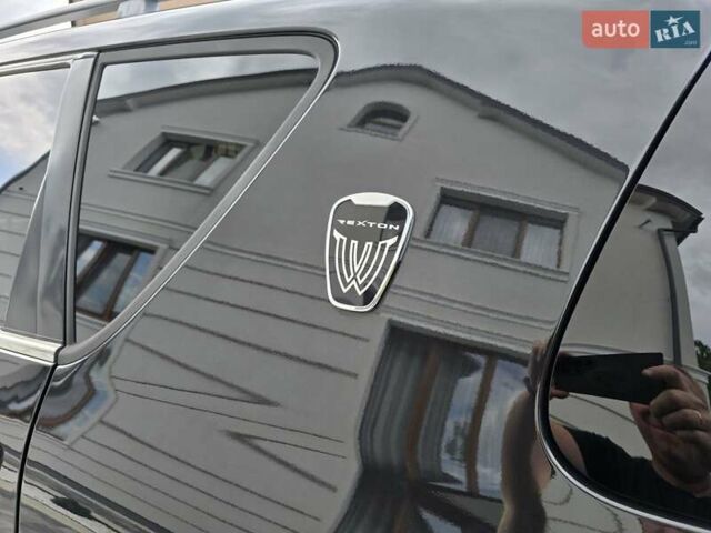 Чорний Cанг Йонг Rexton, об'ємом двигуна 2.7 л та пробігом 160 тис. км за 11500 $, фото 61 на Automoto.ua