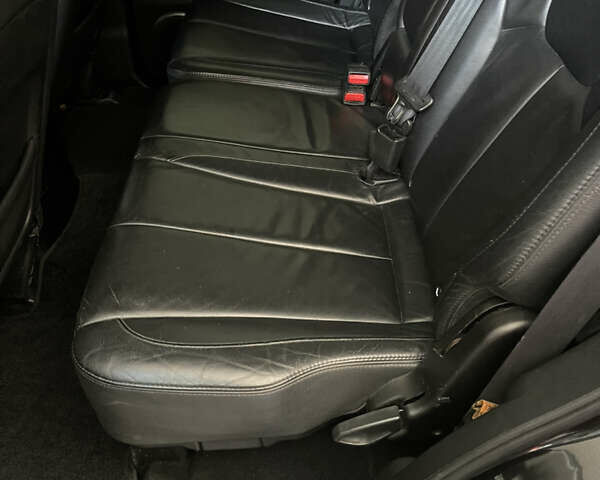 Чорний Cанг Йонг Rexton, об'ємом двигуна 2 л та пробігом 199 тис. км за 9300 $, фото 15 на Automoto.ua