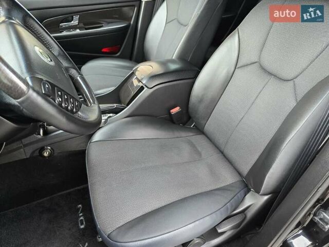 Чорний Cанг Йонг Rexton, об'ємом двигуна 2.7 л та пробігом 160 тис. км за 11500 $, фото 21 на Automoto.ua