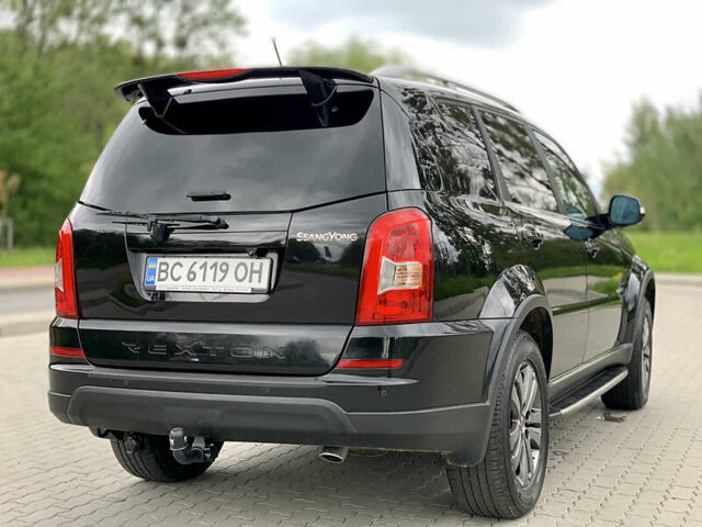 Чорний Cанг Йонг Rexton, об'ємом двигуна 2 л та пробігом 230 тис. км за 14500 $, фото 10 на Automoto.ua